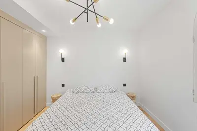 Un ou plusieurs lits dans un hébergement de l'établissement Luxueuse Villa L'Olivier Cannes 4 chambres jacuzzi