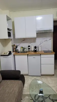 Cuisine ou kitchenette dans l'établissement Studio
