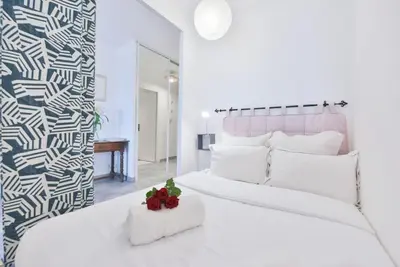 Un ou plusieurs lits dans un hébergement de l'établissement LES BEAUX JOURS Super nice flat for 3 with AC, balcony & view