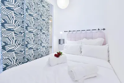 Un ou plusieurs lits dans un hébergement de l'établissement LES BEAUX JOURS Super nice flat for 3 with AC, balcony & view