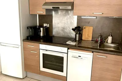 Cuisine ou kitchenette dans l'établissement Villa Paloma city center