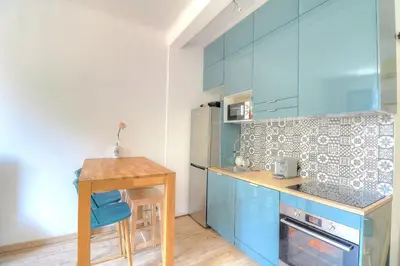 Cuisine ou kitchenette dans l'établissement Joli appartement en bord de mer
