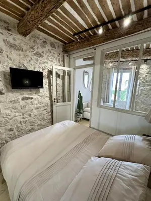 Un ou plusieurs lits dans un hébergement de l'établissement New Charming Apartment Old Town