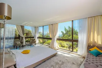 Un ou plusieurs lits dans un hébergement de l'établissement Villa Emilia, vue mer, Super-Cannes