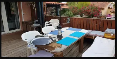 Balcon ou terrasse dans l'établissement Petite Villa 4-6 personnes belles terrasses, piscine, plages
