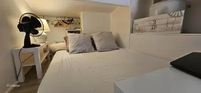 Un ou plusieurs lits dans un hébergement de l'établissement Petite Villa 4-6 personnes belles terrasses, piscine, plages