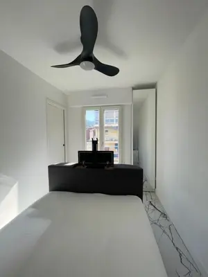 Un ou plusieurs lits dans un hébergement de l'établissement Cannes Appartement Terrasse Parking privé