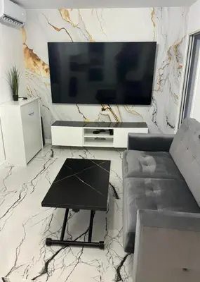 Télévision ou salle de divertissement dans l'établissement Cannes Appartement Terrasse Parking privé