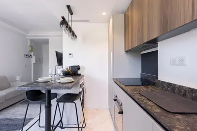 Cuisine ou kitchenette dans l'établissement Studio Jules - Bd de Lorraine