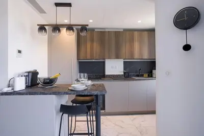 Cuisine ou kitchenette dans l'établissement Studio Jules - Bd de Lorraine