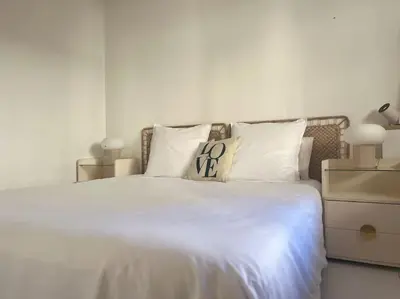 Un ou plusieurs lits dans un hébergement de l'établissement Appartement terrasse Croisette