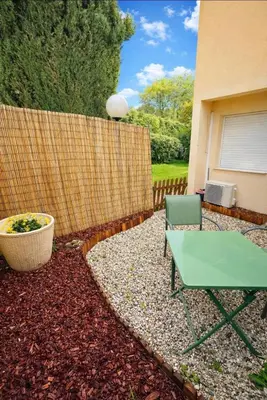 Jardin de l'établissement Charmant studio avec jardin