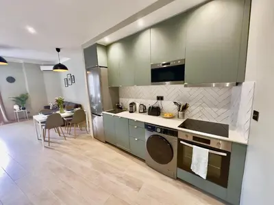 Cuisine ou kitchenette dans l'établissement Cosy Home Cannes - Croisette