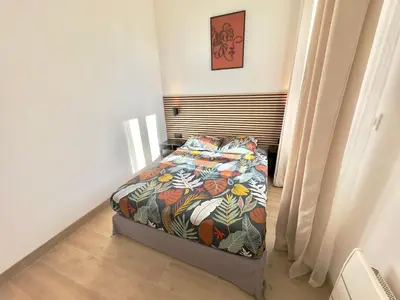 Un ou plusieurs lits dans un hébergement de l'établissement Cosy Home Cannes - Croisette