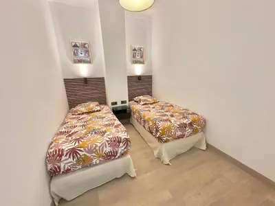 Un ou plusieurs lits dans un hébergement de l'établissement Cosy Home Cannes - Croisette