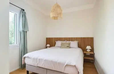 Un ou plusieurs lits dans un hébergement de l'établissement Villa El Sol Antibes