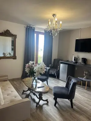 Télévision ou salle de divertissement dans l'établissement Villa Gabriel
