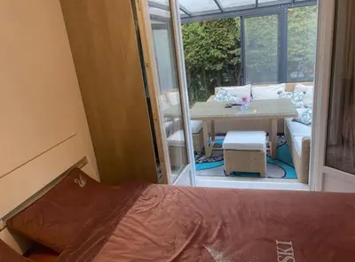 Un ou plusieurs lits dans un hébergement de l'établissement Bas de villa avec piscine et jardin