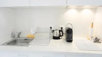 Cuisine ou kitchenette dans l'établissement Proche Palais Des Festivals - Croisette,Studio Bella - Palmazur Vacances