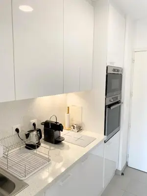 Cuisine ou kitchenette dans l'établissement Proche Palais Des Festivals - Croisette,Studio Bella - Palmazur Vacances
