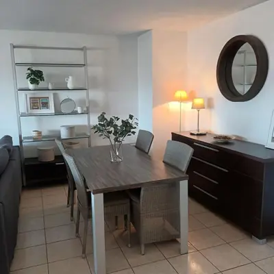 Coin salon dans l'établissement Apt calme 2 chambres vue dégagée