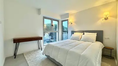 Un ou plusieurs lits dans un hébergement de l'établissement Verdalia luxury 3 bedroom by Welcome to Cannes