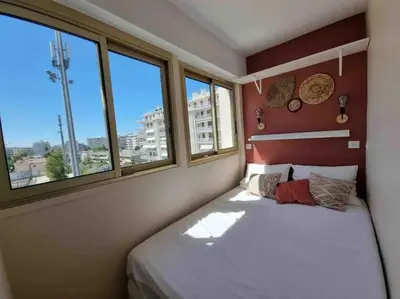 Un ou plusieurs lits dans un hébergement de l'établissement New top floor avec vue mer, Croisette à Palm Beach