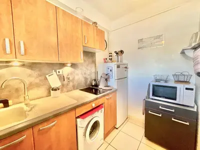 Cuisine ou kitchenette dans l'établissement Le Petit Magellan by Welcome to Cannes
