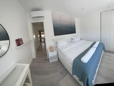 Un ou plusieurs lits dans un hébergement de l'établissement Luxurious 3Bedroom 2 BATH 110 m Apartment Adjoining Hotel Martinez Beachfront