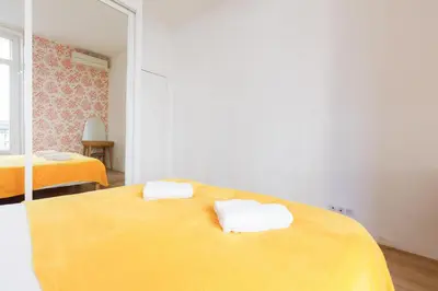 Un ou plusieurs lits dans un hébergement de l'établissement Nasturtium YourHostHelper