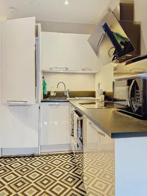 Cuisine ou kitchenette dans l'établissement 2Pièces Marina Baie des Anges