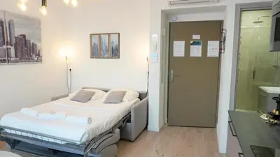 Un ou plusieurs lits dans un hébergement de l'établissement Proche Carlton & Croisette, Appartement 303