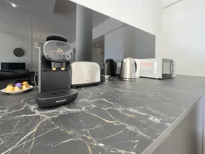 Cuisine ou kitchenette dans l'établissement Le Montfleury by Winsome Destination