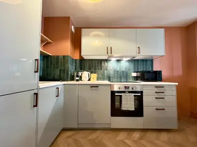 Cuisine ou kitchenette dans l'établissement Le Montébello SCLS - Wifi, Climatisation, Parking