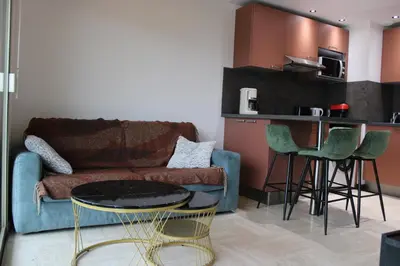 Cuisine ou kitchenette dans l'établissement Cosy 2p