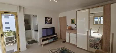 Télévision ou salle de divertissement dans l'établissement L'Hippocampe du Palm Beach