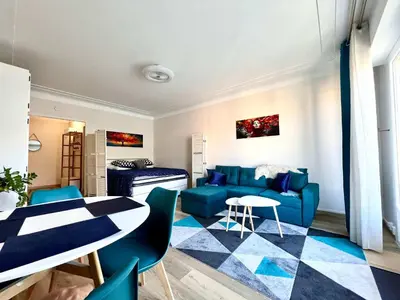 Coin salon dans l'établissement B030 Grand studio renove spacieux et lumineux