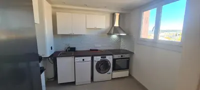 Cuisine ou kitchenette dans l'établissement Azur Horizons Sea and Mountain