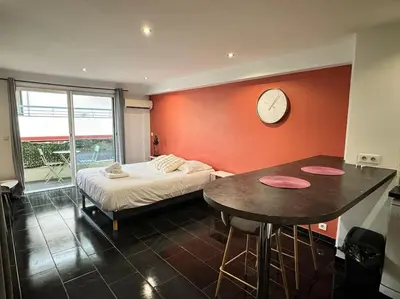 Un ou plusieurs lits dans un hébergement de l'établissement Grand Studio Centre Cannes