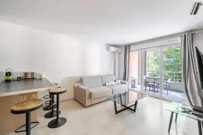 Coin salon dans l'établissement Magnificent apartment with parking - AC-balcony