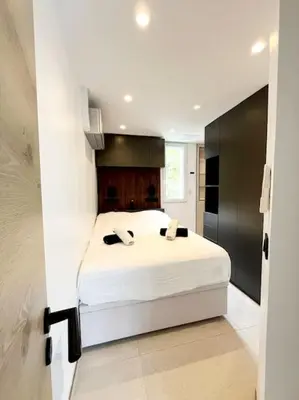 Un ou plusieurs lits dans un hébergement de l'établissement Appartement 4 pièces luxueux