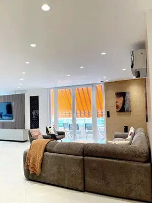 Coin salon dans l'établissement Appartement 4 pièces luxueux