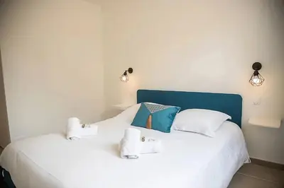 Un ou plusieurs lits dans un hébergement de l'établissement Appartement tout confort au Cœur d'Antibes