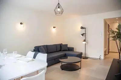 Coin salon dans l'établissement Appartement tout confort au Cœur d'Antibes