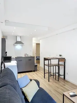 Coin salon dans l'établissement Studio proche mer - Climatisé