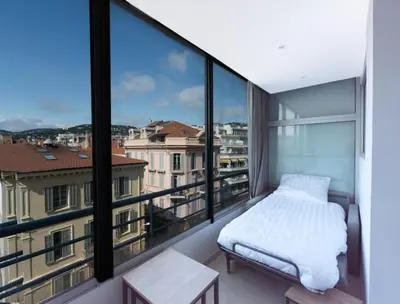 Un ou plusieurs lits dans un hébergement de l'établissement Le Grand Hôtel -Centre Croisette