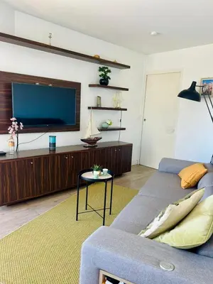 Coin salon dans l'établissement Bel appartement Port Vauban à 100m des plages