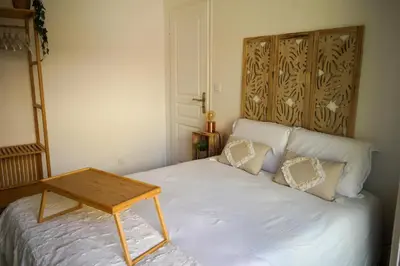 Un ou plusieurs lits dans un hébergement de l'établissement Cosy corner Paradise