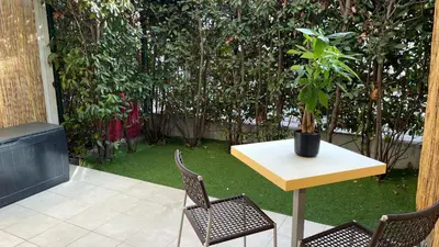 Jardin de l'établissement Studio proche plage avec jardinet et parking - Casa Garcia