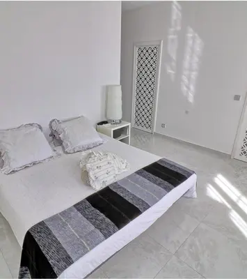 Un ou plusieurs lits dans un hébergement de l'établissement Appartement Haut Standing 5 pièces Cannes centre